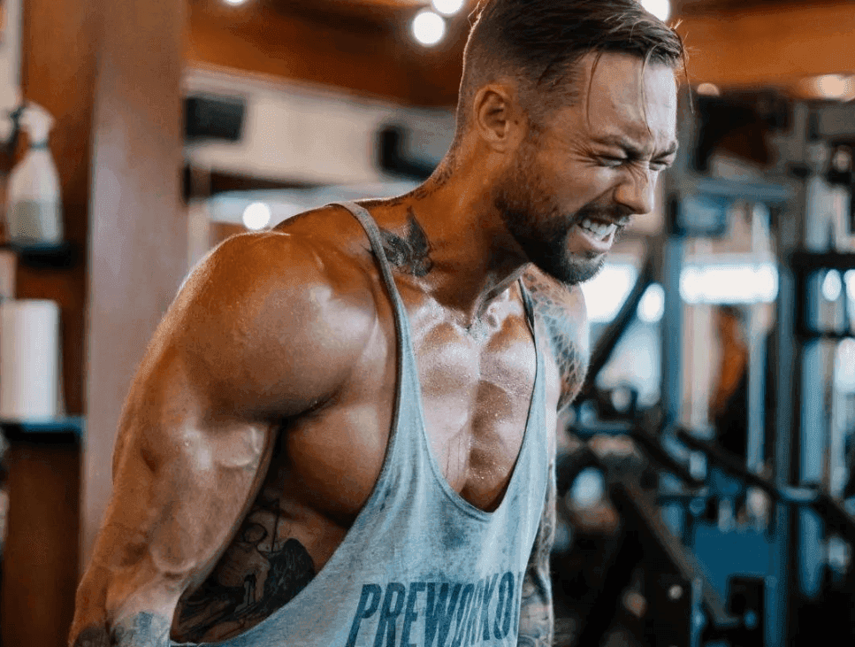 gym beginner tips workout routine with trainer guiding first-time gym user