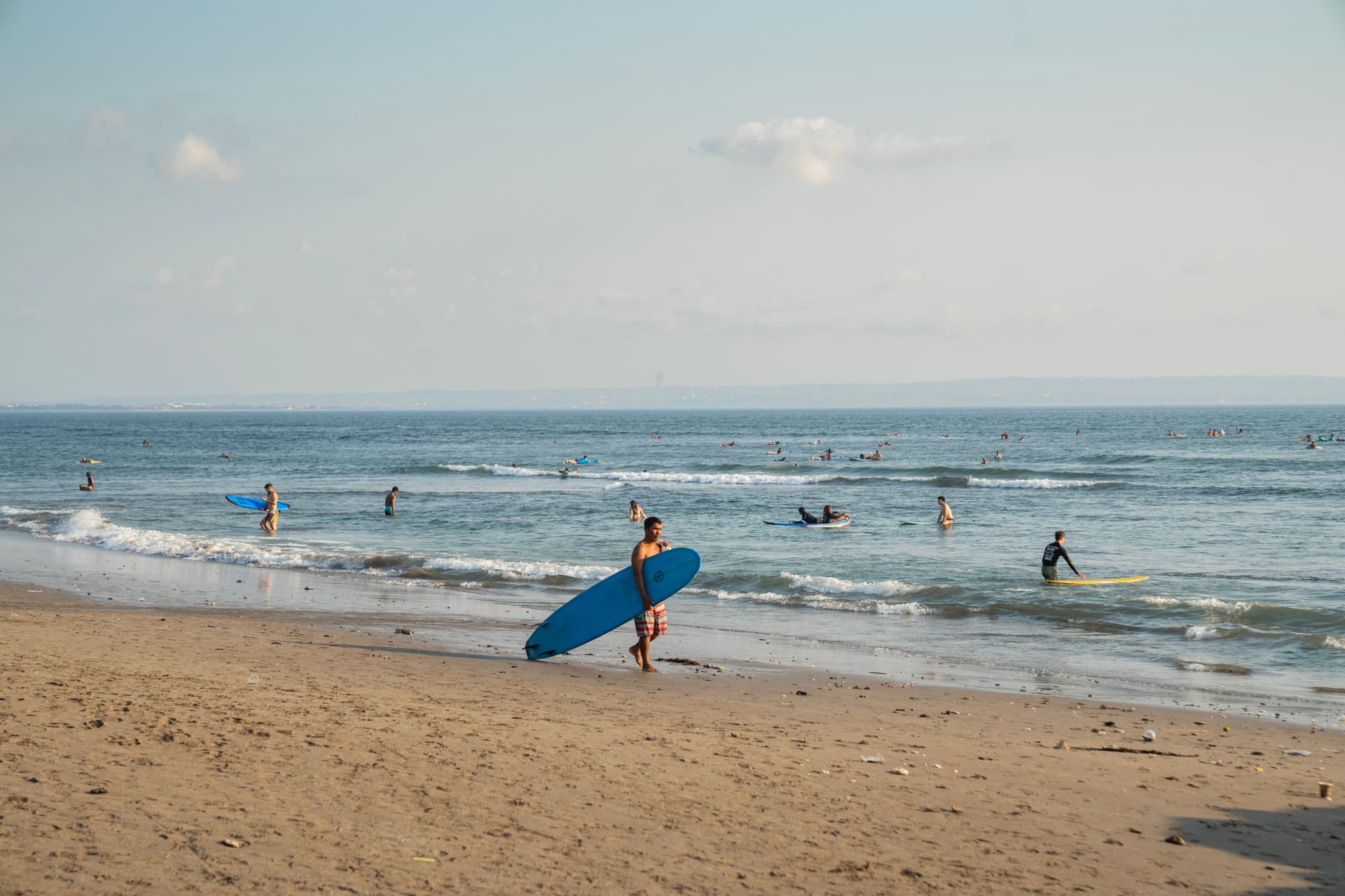 Surfing as a Full-Body Workout: The Best Beaches in Bali for Beginners and Pros